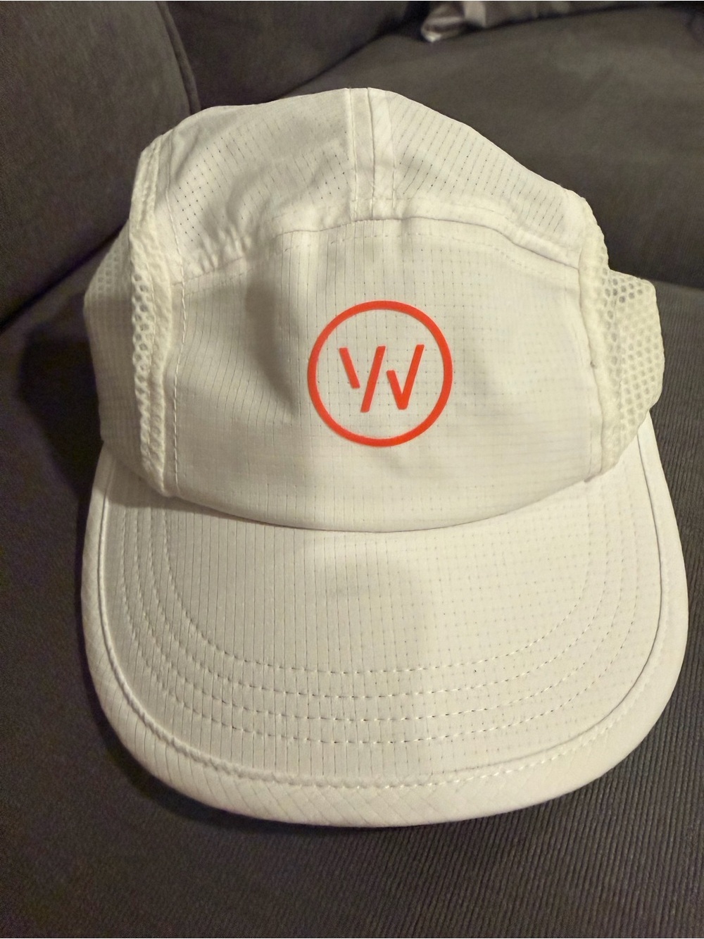 White Performance Cap with Orange Whoop Logo